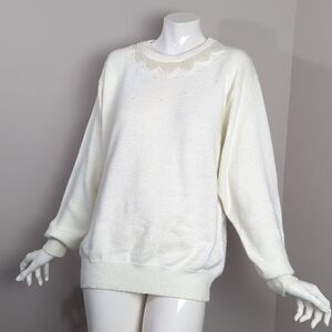 Vintage cream crew neck knit sweater with pearl embellishments.
